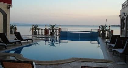 New luxury apartment directly on the private sandy beach in 4 star aparthotel