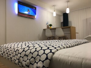 1 dormitorio, sistema de insonorización, tabla de planchar con plancha