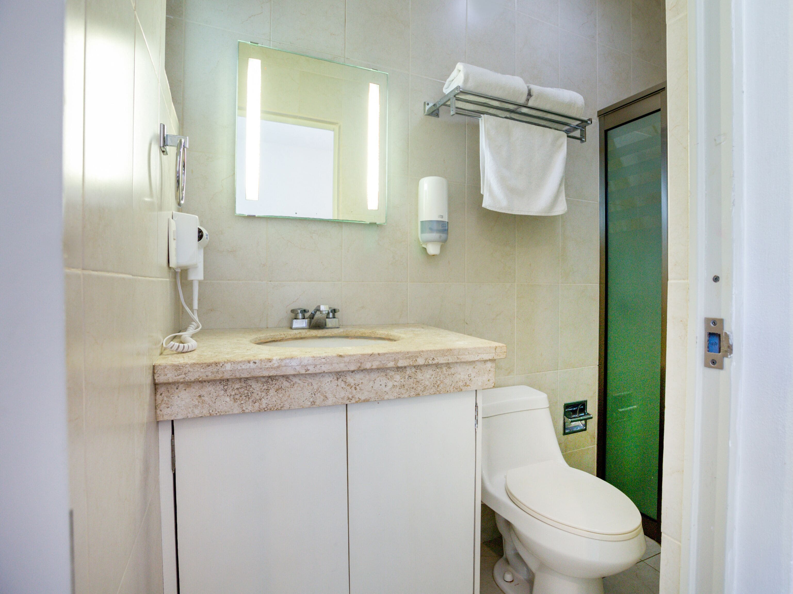 superior room, 1 king bed | bathroom | shower, rainfall showerhead, hair dryer, towels