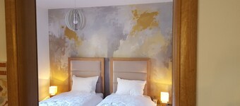 Apartment in a mountain house in a modern and cozy style, garden and terrace