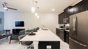 House | Private kitchen | Stovetop, dishwasher, cookware/dishes/utensils - 4BR Town Home In Champions Gate (Davenport)