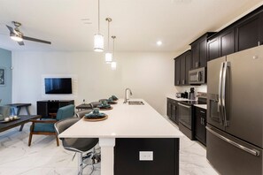 House | Private kitchen | Stovetop, dishwasher, cookware/dishes/utensils - 4BR Town Home In Champions Gate (Davenport)