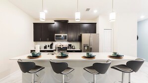 House | Private kitchen | Stovetop, dishwasher, cookware/dishes/utensils - 4BR Town Home In Champions Gate (Davenport)