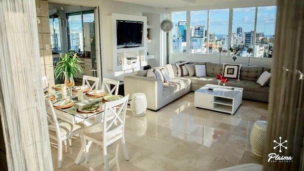 Apartment, 2 Bedrooms (Jacuzzi) | Living area | Flat-screen TV - 2BR Apt Naco at Torre Kensington by ASVR (Santo Domingo)
