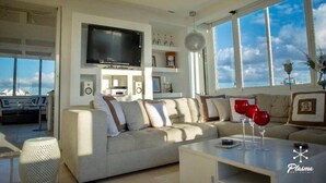 Apartment, 2 Bedrooms (Jacuzzi) | Living area | Flat-screen TV - 2BR Apt Naco at Torre Kensington by ASVR (Santo Domingo)