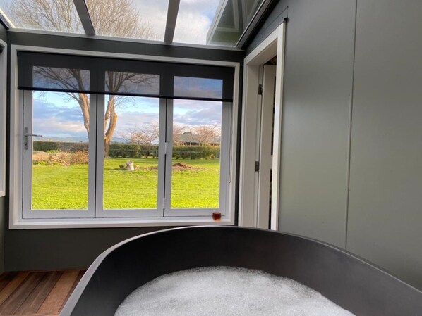 Luxury Loft | Bathroom | Designer toiletries, hair dryer, bathrobes, slippers