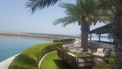 Idyllic Seaside Residence. Lush Golf & Ocean Views. Superb on site amenities.