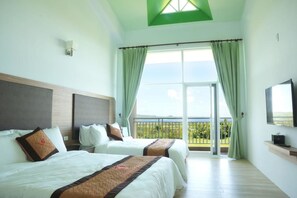 Quadruple Room, Ocean View | Laptop workspace, blackout drapes, free WiFi, bed sheets