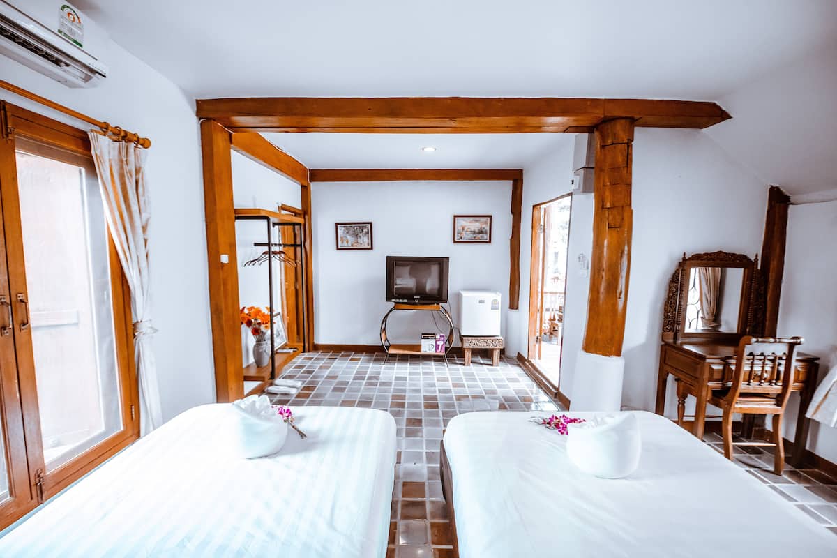 classic twin room | minibar, individually decorated, desk, blackout curtains