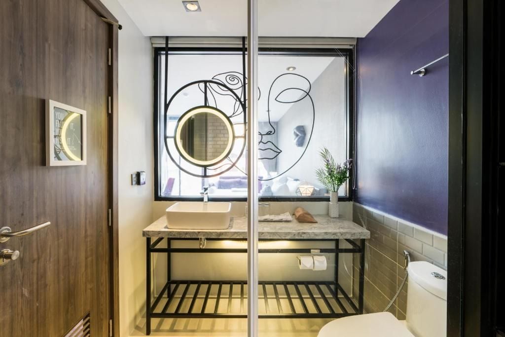 deluxe room | bathroom | shower, free toiletries, bathrobes, slippers
