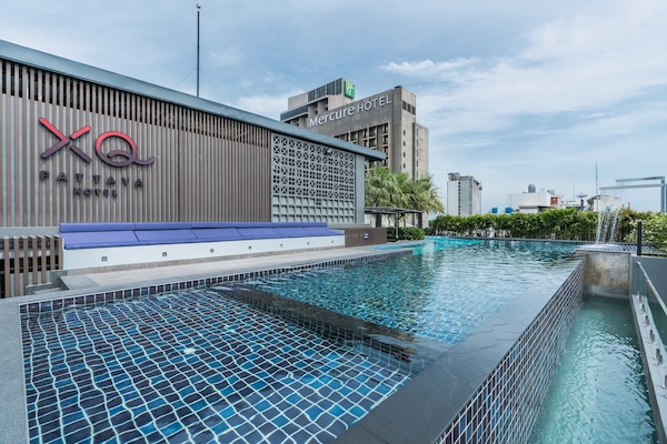 Outdoor pool, open 8:00 AM to 9:00 PM, free cabanas, pool umbrellas
