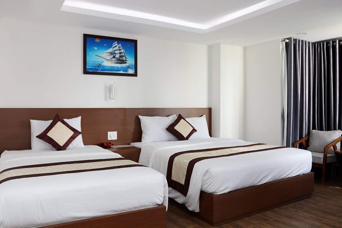 Deluxe Triple Room, Balcony, City View | Premium bedding, minibar, in-room safe, individually decorated