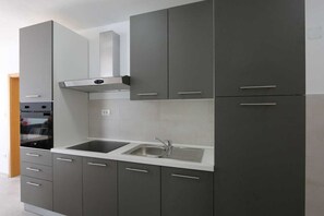 Fridge, coffee/tea maker, cookware/dishes/utensils, dining tables - Apartment Mihalić (10070-A4) (Silo - island Krk)