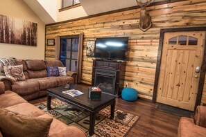 Smart TV, fireplace, DVD player, foosball