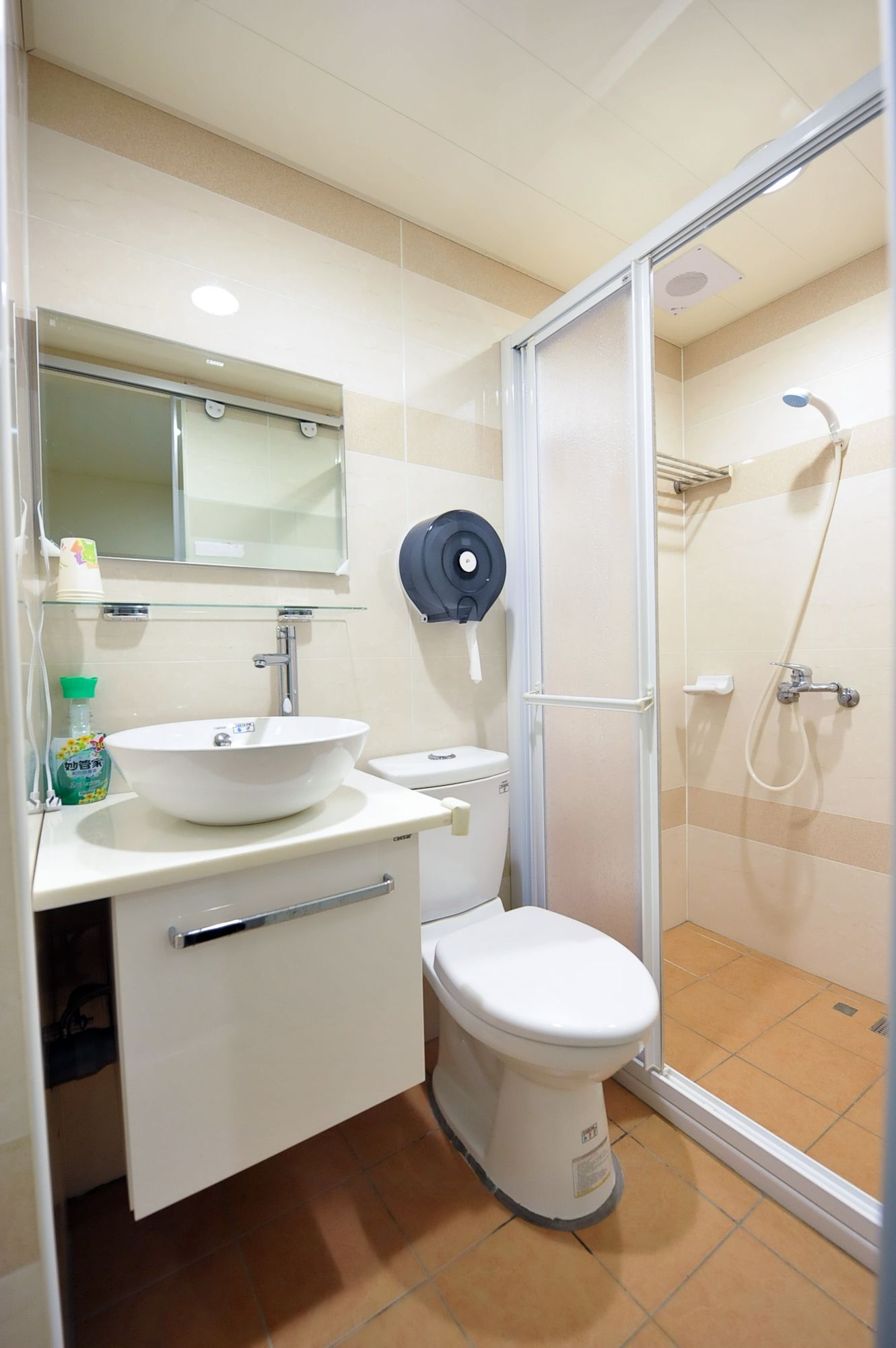 Shower, free toiletries, hair dryer, slippers