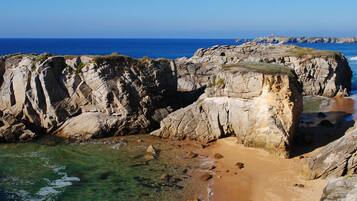 Beach nearby, sun loungers