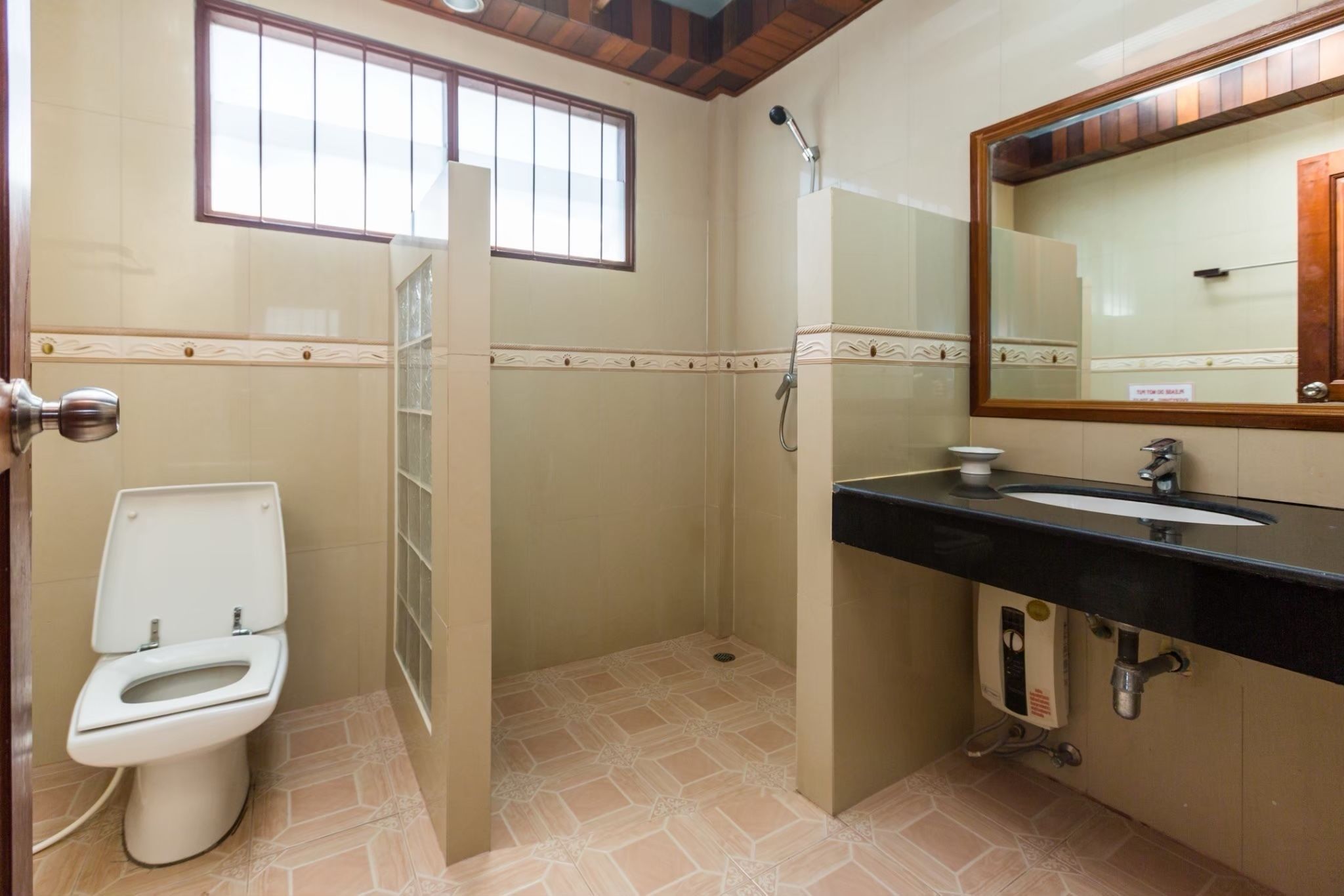 bungalow, beachfront | bathroom | shower, towels, soap, shampoo