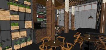 Un café acogedor con estanterías, mesas y sillas de madera.