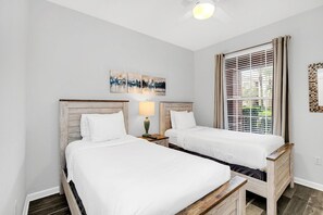 This awesome bedroom- where wooden furnishings add warmth to your serene retreat. - Resort & Pool Access 3BR Condo near Epic Universe! (orlando)