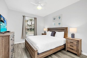 Indulge in comfort and luxury in our Cayview Unit bedroom – your serene escape awaits. - Resort & Pool Access 3BR Condo near Epic Universe! (orlando)