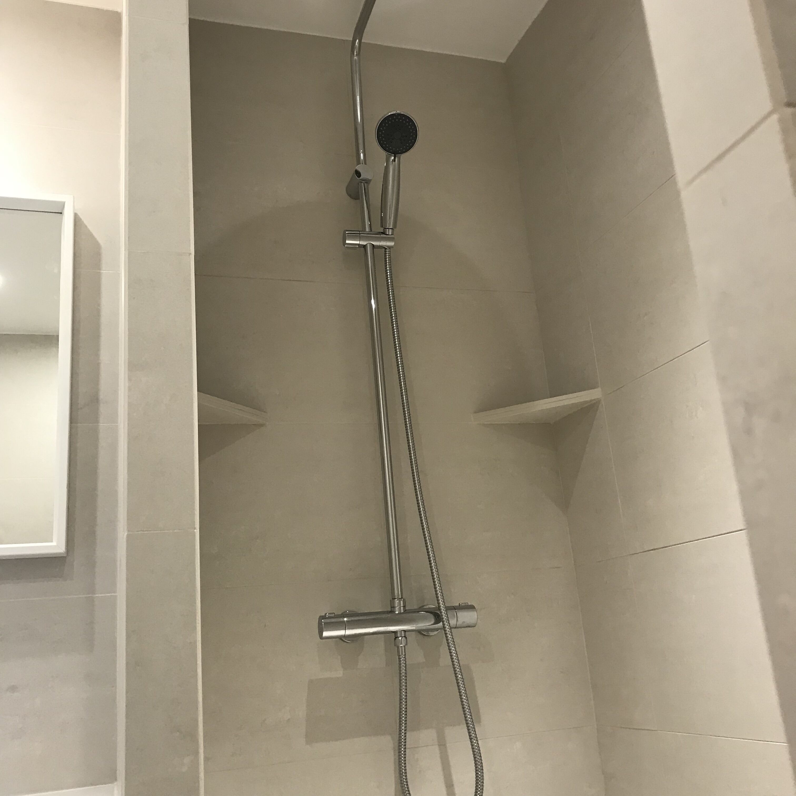 Bathtub, towels, soap, toilet paper