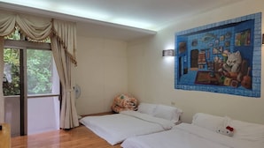A room with two beds, a window with curtains, a wall mural, and a fan. - Lohas Gallery Long Stay Hostel (New Taipei City)