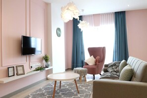 コンフォート アパートメント | リビングルーム | 薄型テレビ、Netflix