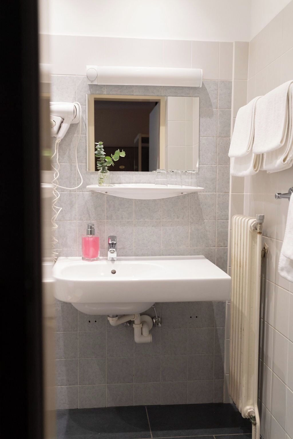 quadruple room | bathroom | hair dryer, towels, soap, shampoo