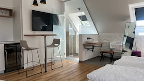 Roof top Suite | Literie hypoallergénique, rideaux occultants, fer et planche à repasser