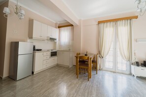 Fridge, oven, electric kettle, toaster