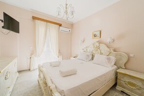 1 غرفة نوم ومكواة/لوح كي وواي فاي وملاءات أسرّة