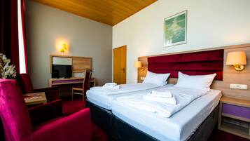 Ropa de cama hipoalergénica, escritorio, camas extra y wifi gratis