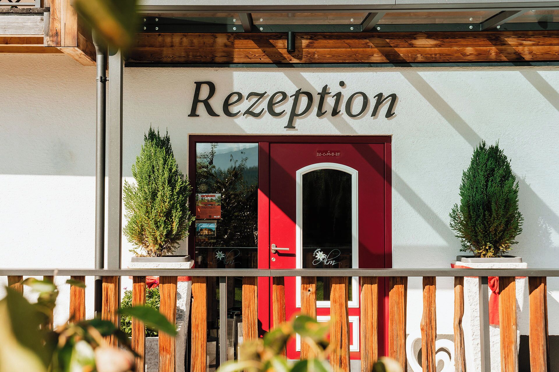 A building with a sign reading 'Rezeption' indicating a reception area.