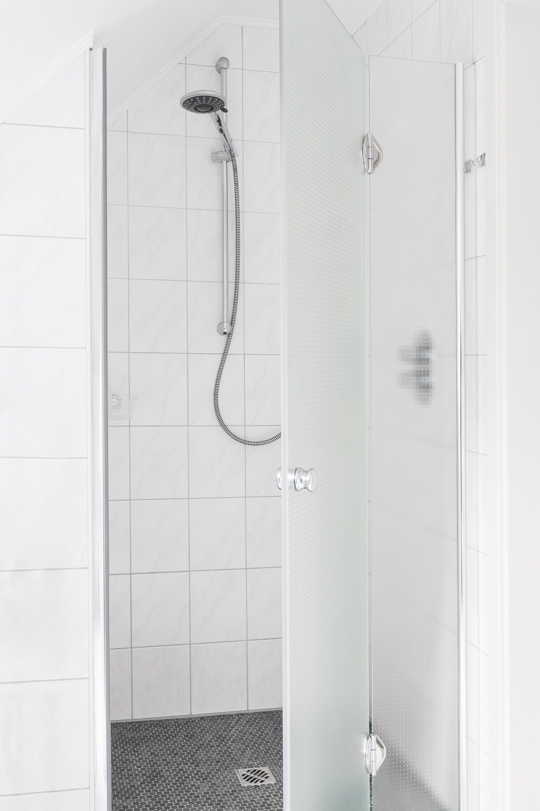 Combined shower/tub, hair dryer, towels, toilet paper