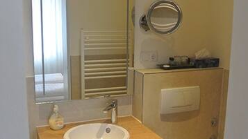 Shower, free toiletries, towels, soap