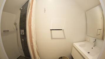 Shower, towels, toilet paper