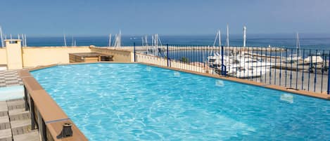 Seasonal outdoor pool, a rooftop pool