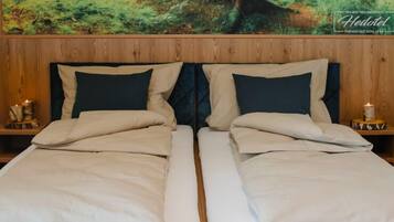 Minibar, desk, soundproofing, cots/infant beds