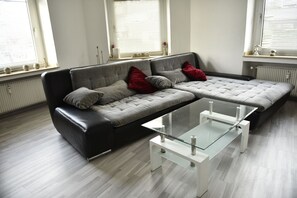 Comfort Condo, City View | Living area | 55-inch flat-screen TV with satellite channels, Smart TV