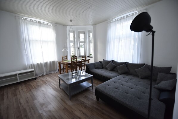 Comfort Condo, City View | Living area | 55-inch flat-screen TV with satellite channels, Smart TV