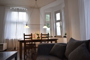 Comfort Condo, City View | Living area | 55-inch flat-screen TV with satellite channels, Smart TV