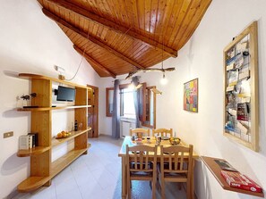Family Bungalow, 2 Bedrooms, Terrace, Partial Sea View (Vulcano) | Dining room