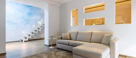 Standard Suite | Living area | Flat-screen TV