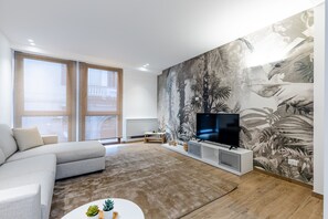 Suite Standard | Area soggiorno | TV a schermo piatto