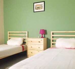 Desk, blackout curtains, iron/ironing board, cots/infant beds
