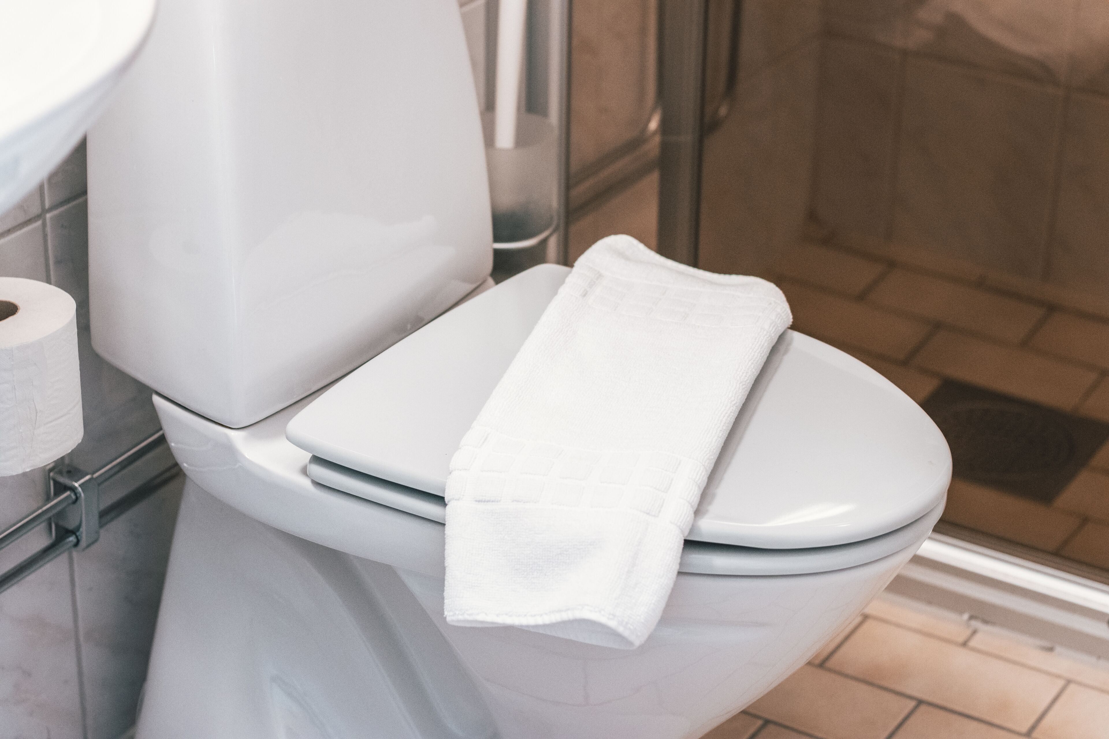 designer toiletries, hair dryer, towels, soap