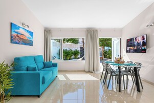 Superior Bungalow, 2 Bedrooms, Hot Tub | Living area | 40-inch flat-screen TV with cable channels, TV