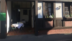 A hotel restaurant with a sign reading "Hotel-Restaurant" and "Zur Pfalz". - Hotel zur Pfalz (Hockenheim)