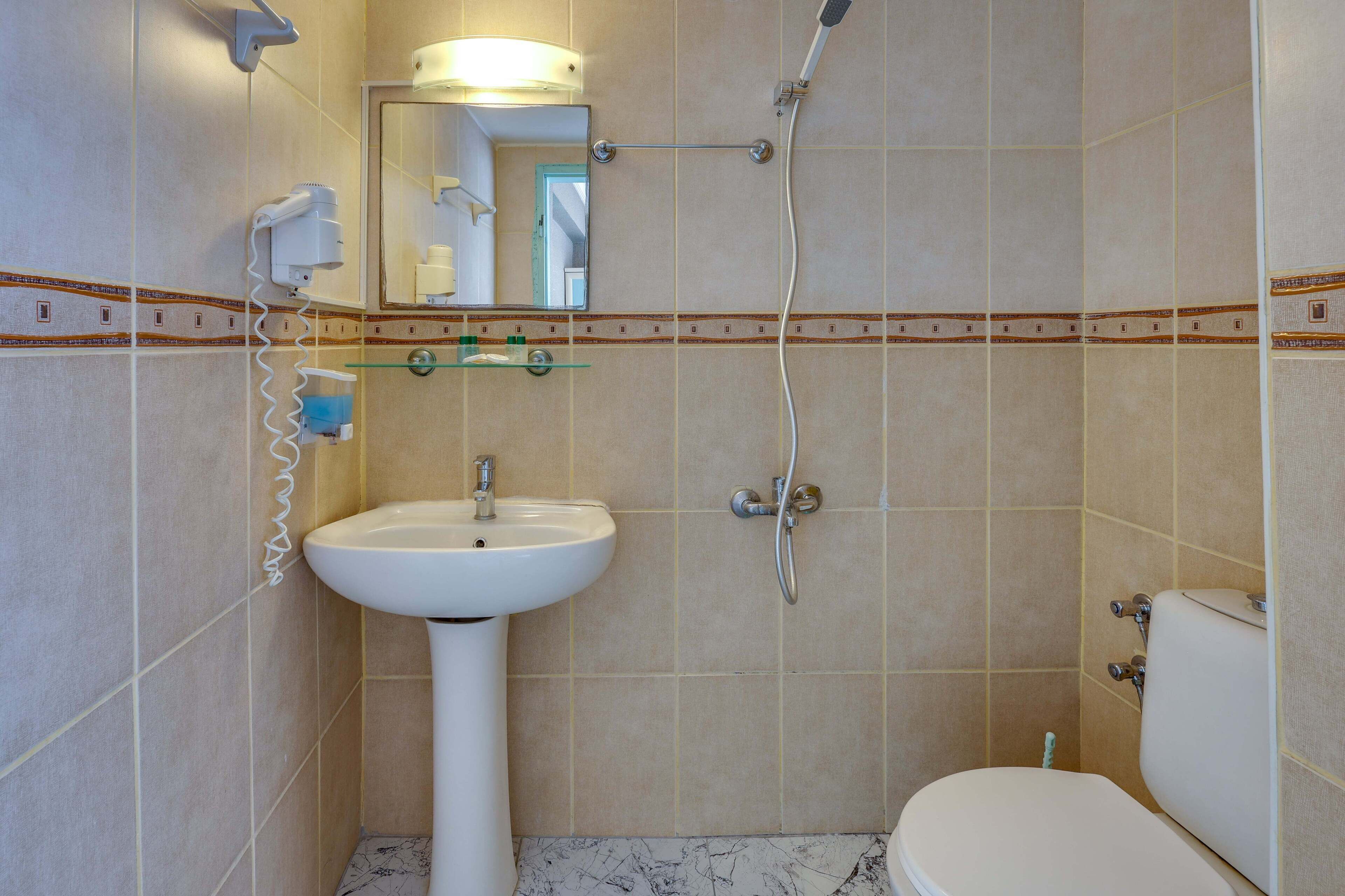 shower, free toiletries, hair dryer, slippers