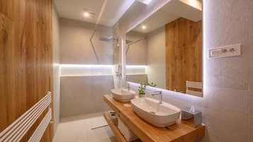 Superior Apartment, Garden View | Bathroom | Shower, rainfall showerhead, designer toiletries, hair dryer
